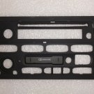 GM radio face without buttons or lens. New OEM part. Cassette and/or CD