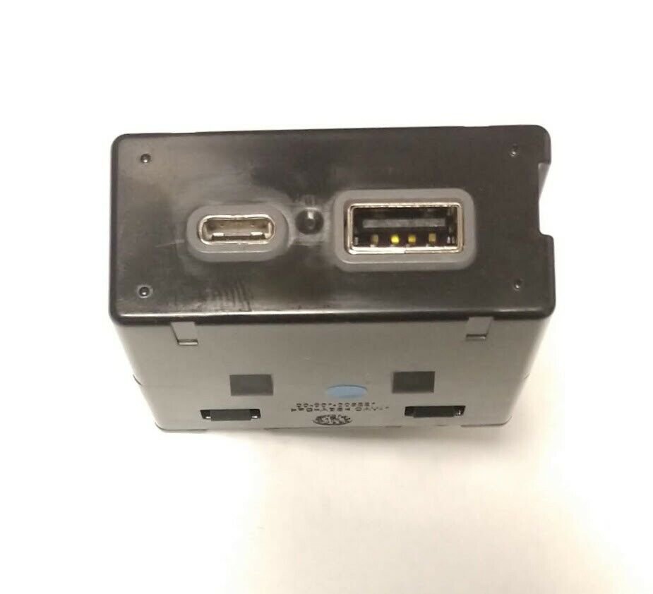 XT4 USB + USB-C plug module for rear of center console. OEM new. Charging only