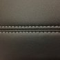 XTS 2013-2018 jet black leather center console armrest lid top. Gray stitching