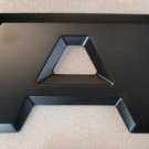 2014-2020 RAM truck tailgate emblem letter in black. With 3M adhesive! A 2014-2020 RAM truck tailgate emblem letter in black. With 3M adhesive! A