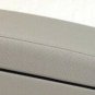 Platinum gray leather armrest console lid. OEM new for 2014-2018 Cadillac CTS