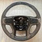 Factory original very dark atmosphere steering wheel for 2023 Silverado 3500