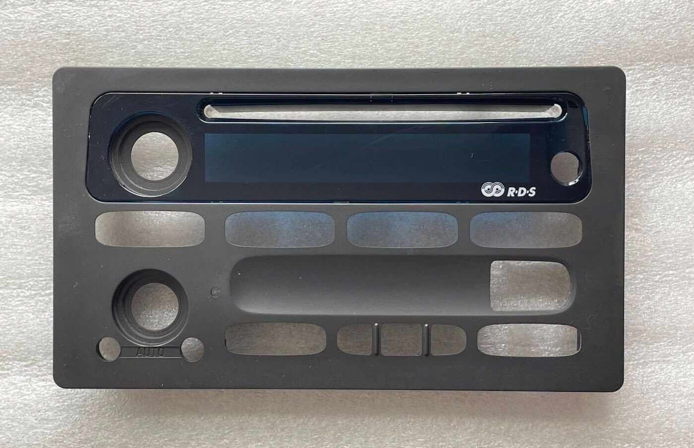 GM radio face. Is yours worn? Solve it w/ this OEM part.Some 2000+ car, mini-van