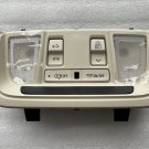 XT5 overhead console switch and light assembly. OnStar, Sunroof. Lt Wheat +black