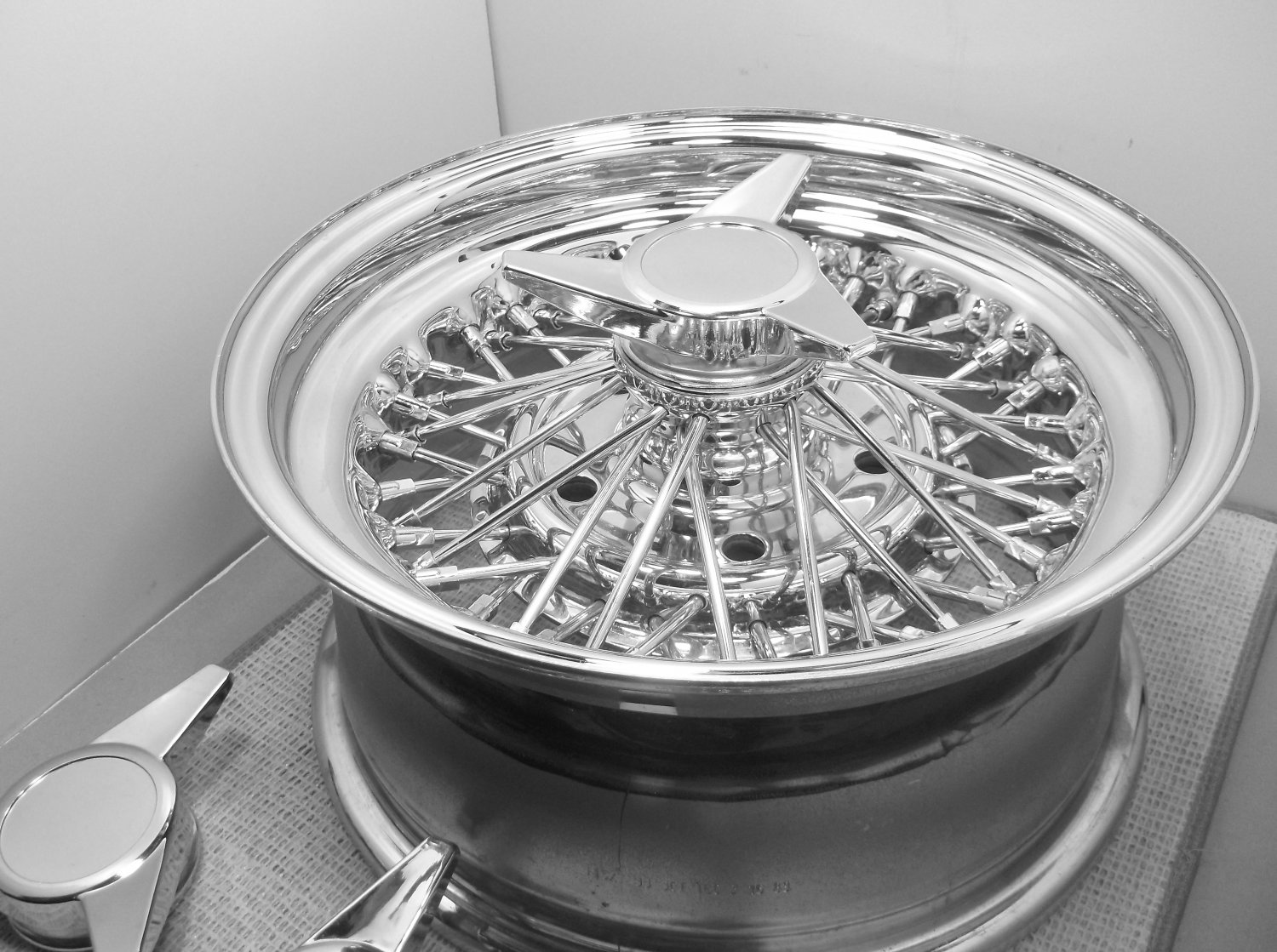 TRU SPOKE THREE BAR SWEPT WING SPINNER SET A NEW SET OF FOUR.