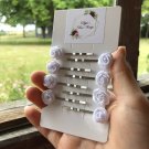 White floral grips x4