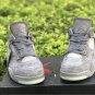 KAWS x Air Jordan 4 &acirc;��Cool Grey&acirc;��