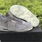 KAWS x Air Jordan 4 &acirc;��Cool Grey&acirc;��