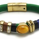 Green Strap Bracelet With Clear And Yellow Stone Accents And Magnetic Closure