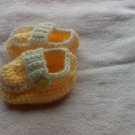 Yellow side buttoned loafers for newborns