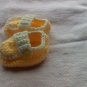 Yellow side buttoned loafers for newborns