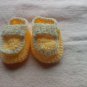 Yellow side buttoned loafers for newborns