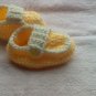 Yellow side buttoned loafers for newborns