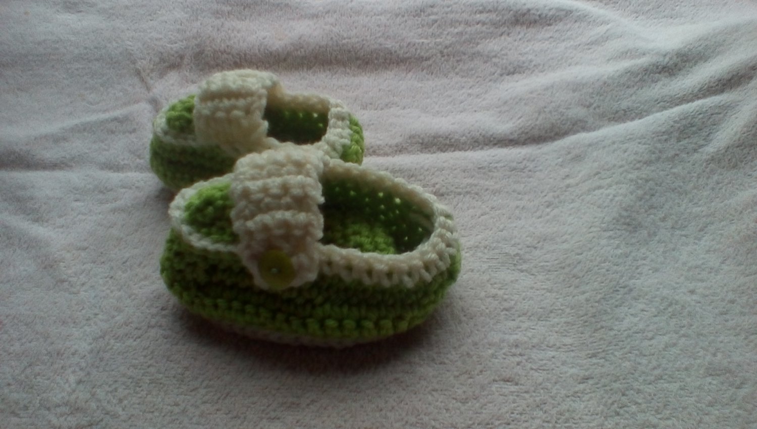 Light green newborn button sided loafers