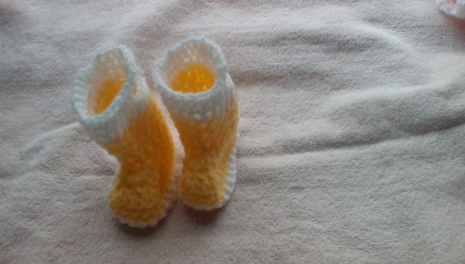 Newborn yellow and cream rainboots