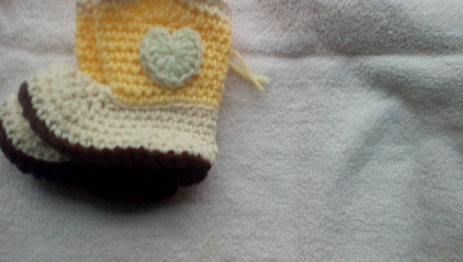 Newborn yellow and cream crocheted cowboy booties