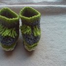 Newborn two toned  light green, and gray moccasins