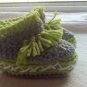 Newborn two toned  light green, and gray moccasins