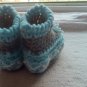 Newborn two toned  light blue, and gray moccasins