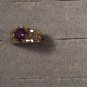 Gold platedRing size 7 China w/ruby and 8 clear stones