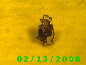 Cowboy on Stool Hat Pin