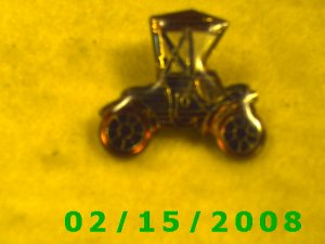 The Red Horseless Carriage Hat Pin