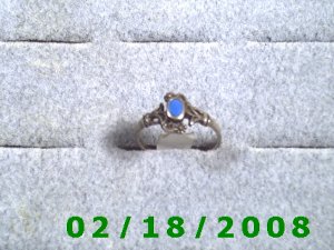 .925 Silver Ring size 6 w/blue stone