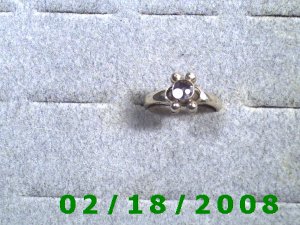 .925 Silver Ring size 7 w/light purple stone