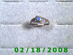 .925 Silver Ring size 7 w/blue stone