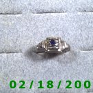 Silver Ring size 7 w/small blue stone