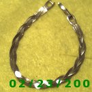  7" 6mm wide Three Strand Braided Gold Plated Bracelet Signed Monet (039)