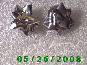 Silver Bow Pierced Earrings     C002