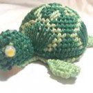 Green plastic canvas turtle
