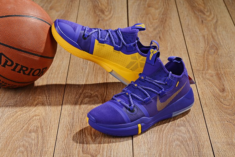 kobe bryant shoes purple yellow