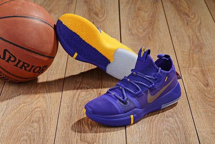 kobe bryant shoes purple yellow