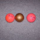 2 Vintage 1980's Pink Spalding Flying Lady Golf Balls and One Gold Golf Ball