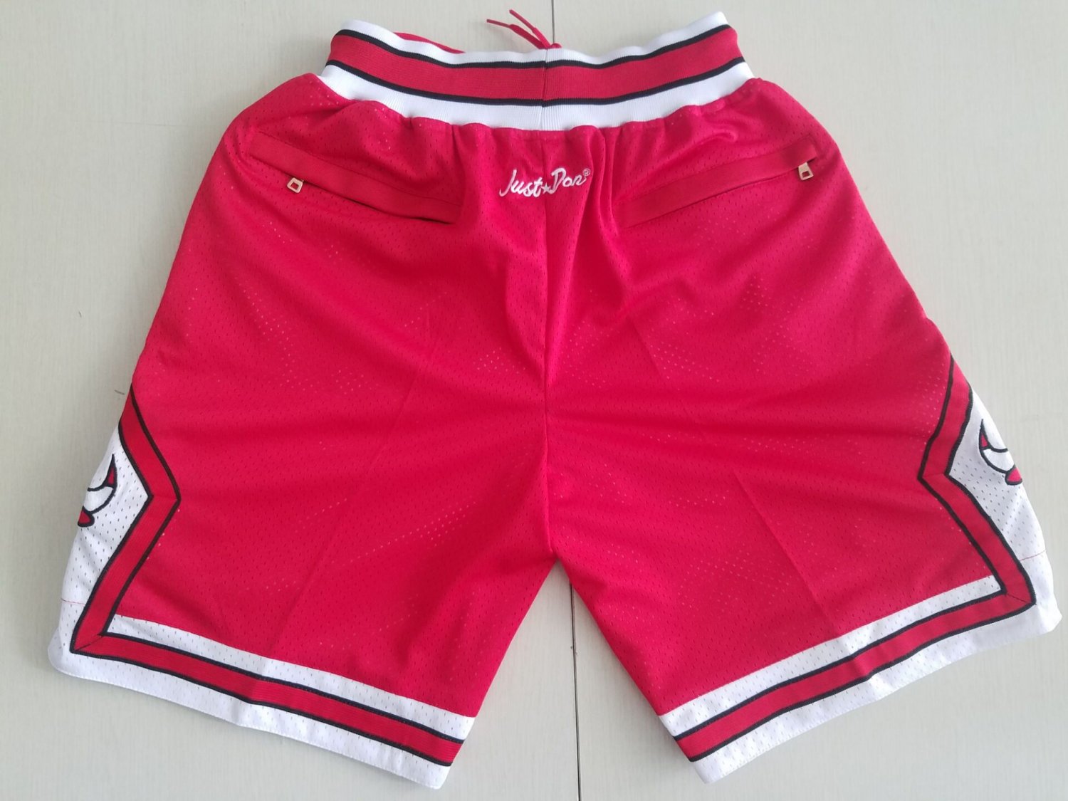 white and red bulls shorts