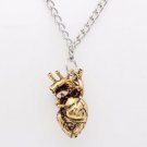 Silver and Gold Anatomical Heart Necklace