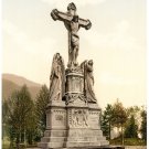 6434.Statue of christ at the cross.two people at his side.POSTER.art wall decor
