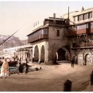 6909.Muslin people walking at the edge of water.POSTER.art wall decor