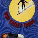 6293.Sun Valley Idaho.Man skiing in sun.woman in snow.POSTER.Home Office art