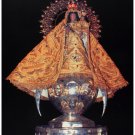 7641.Cuban saint statue on yellow dress.floats on chalice..POSTER.art wall decor 7641.Cuban saint statue on yellow dress.floats on chalice..POSTER.art wall decor