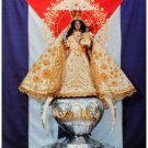 7644.Cuban saint statude on chalice in front of cuban flag.POSTER.art wall decor