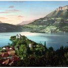 7514.Castle at end of inlet.village facing lake.mountains.POSTER.art wall decor