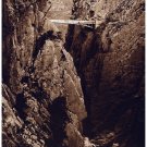 8190.Bridge between two mountain sides.over rocky river.POSTER.art wall decor