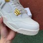Nike Air Jordan 4 with Metallic Gold