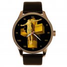 COLLECTIBLE ART WATCHES: SALVADOR DALI CRUCIFIXION OF CHRIST SOLID BRASS WATCH