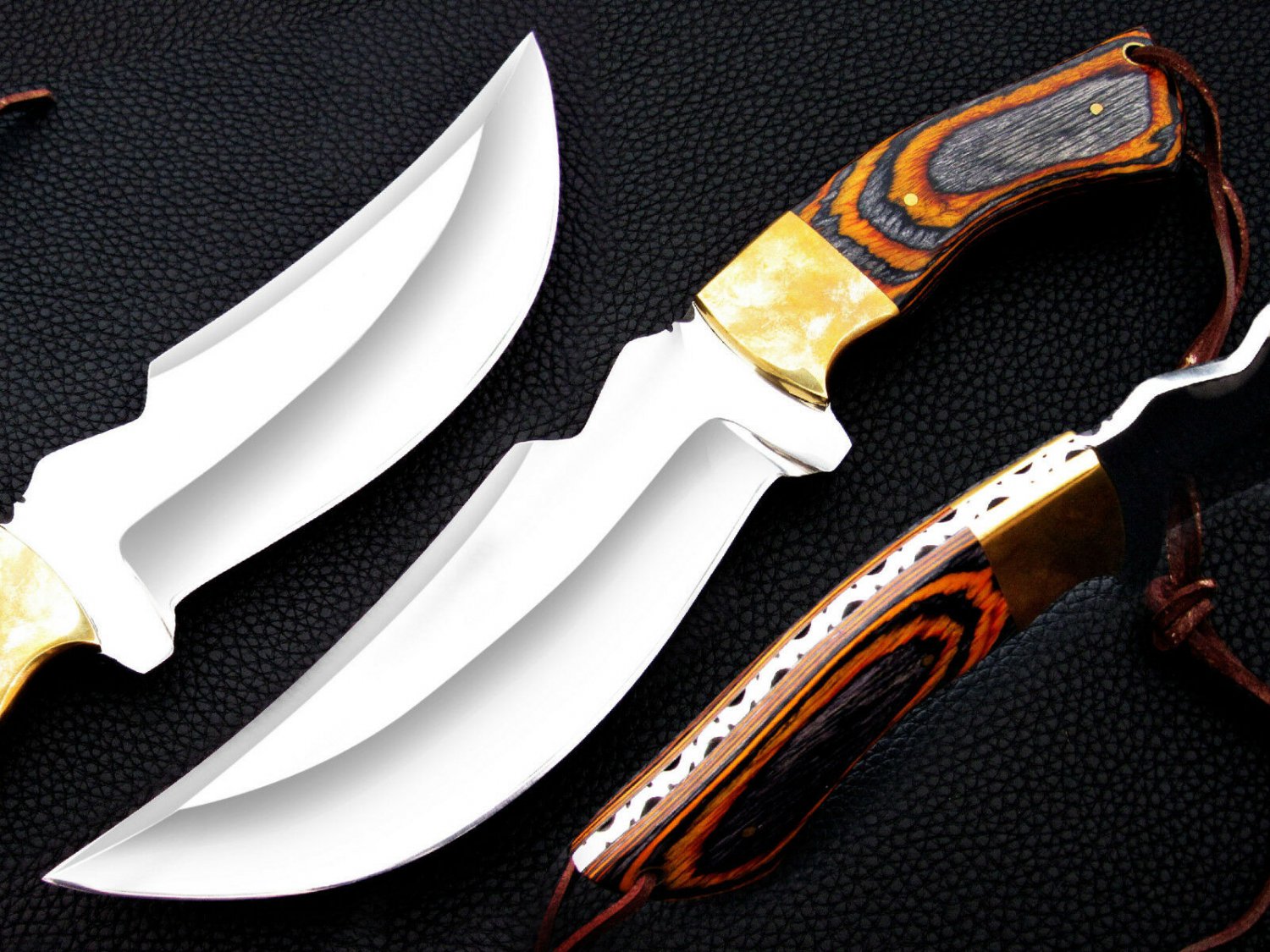 steel j2 tracker with brass bolster knive