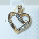 10K Gold Diamond & Baguette Heart Pendant 10K Gold Diamond & Baguette Heart Pendant