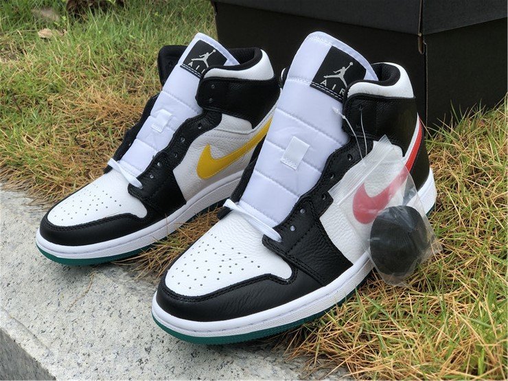 red and yellow jordans 1